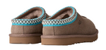 Pair of brown slippers with blue trim on a white background - Image 4