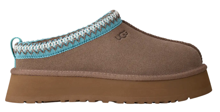 Brown slipper with a blue and white crocheted trim on a white background