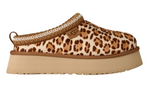 Leopard print slip-on shoe with a beige platform sole on a white background - Image 1