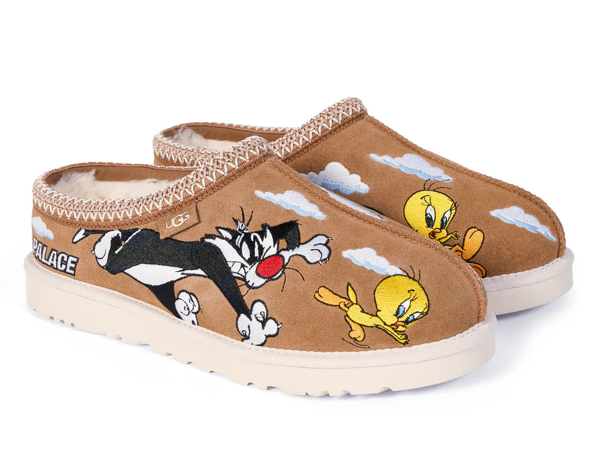 Brown slippers with cartoon characters on a white background