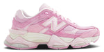 A pair of New Balance 9060 pink overdye sneakers with a mesh upper and a rubber sole. - Image 1