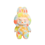 Colorful plush toy with bunny ears on a white background - Image 1