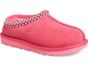 Pink UGG slipper with decorative trim on a white background