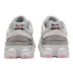 Pair of gray sneakers with pink accents on a white background - Image 3