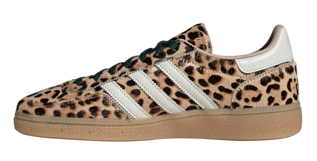 Leopard print sneaker with white stripes on a white background