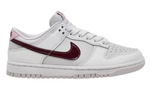 White sneaker with a maroon swoosh logo on a white background - Image 1