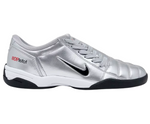 Silver sports shoe with black sole on a white background - Image 1