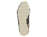 Close-up of an Adidas shoe sole on a white background - Image 5