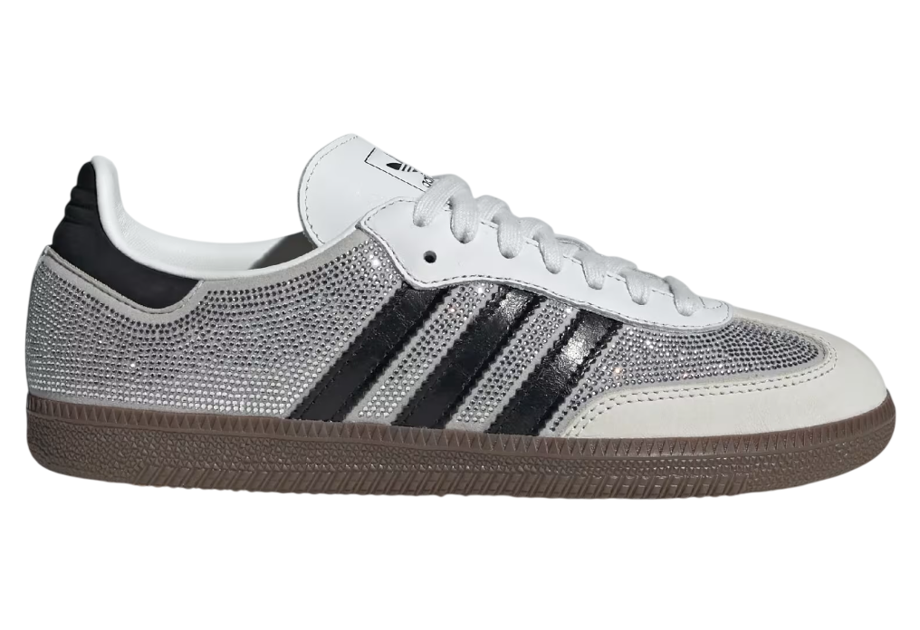 Silver and black Adidas sneaker on a white background