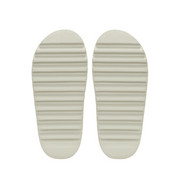 Pair of light gray shoe insoles on a white background