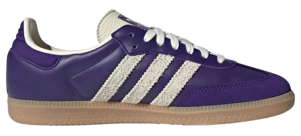 Purple Adidas sneaker with white stripes on a white background