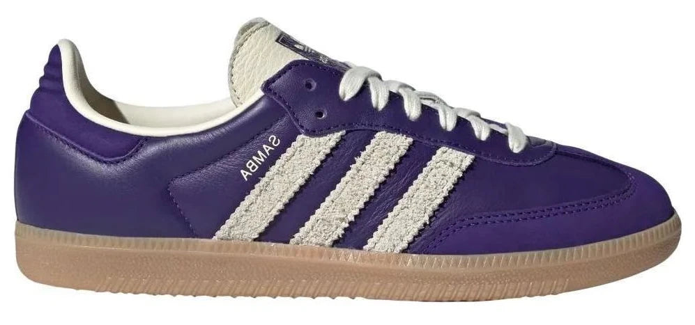 Purple sneaker with white stripes and 'Samba' branding on a white background