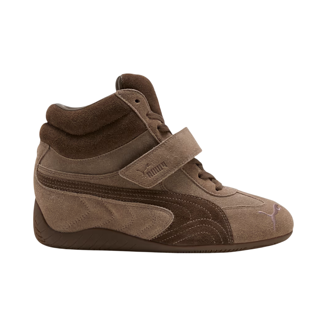 Brown high-top sneaker with a visible Puma logo on a white background