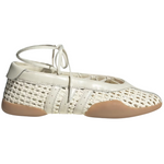White woven shoe with tan insole on a white background - Image 1