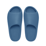 Pair of blue slippers on a white background - Image 2
