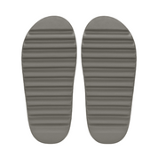 Pair of gray striped shoe inserts on a white background