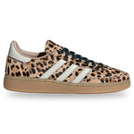 Leopard print sneaker with white stripes on a white background - Image 1