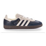 Navy and white Adidas sneaker on a white background - Image 1