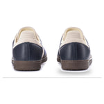 Navy and beige shoes on a white background - Image 5