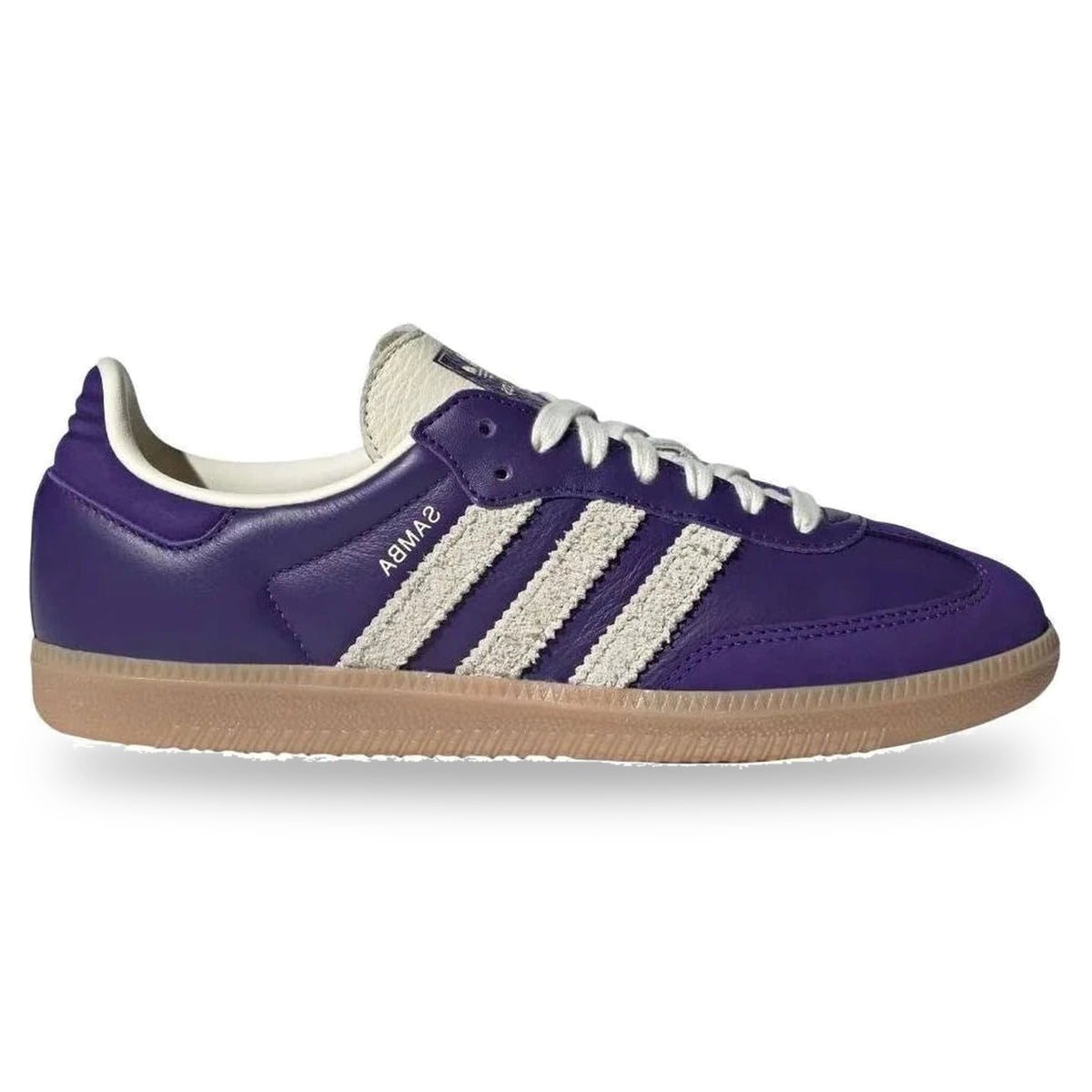Purple sneaker with white stripes and 'Samba' branding on a white background