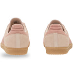 Pair of pink sneakers with brown soles on a white background - Image 6