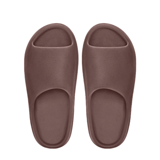 Pair of brown slippers on a white background