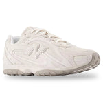 White sneaker with New Balance logo on a white background - Image 2