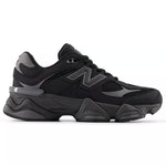 Black athletic shoe with red accents on a white background - Image 1