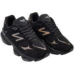 Pair of black athletic shoes with brand logo on a white background - Image 2