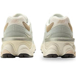 Pair of light gray sneakers with New Balance logo on a white background - Image 5