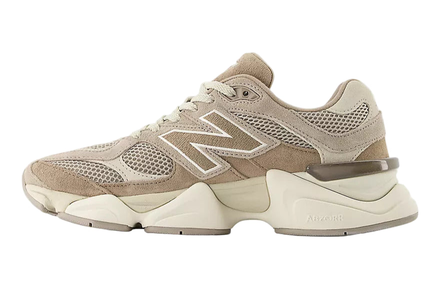 Beige sneaker with New Balance logo on a white background
