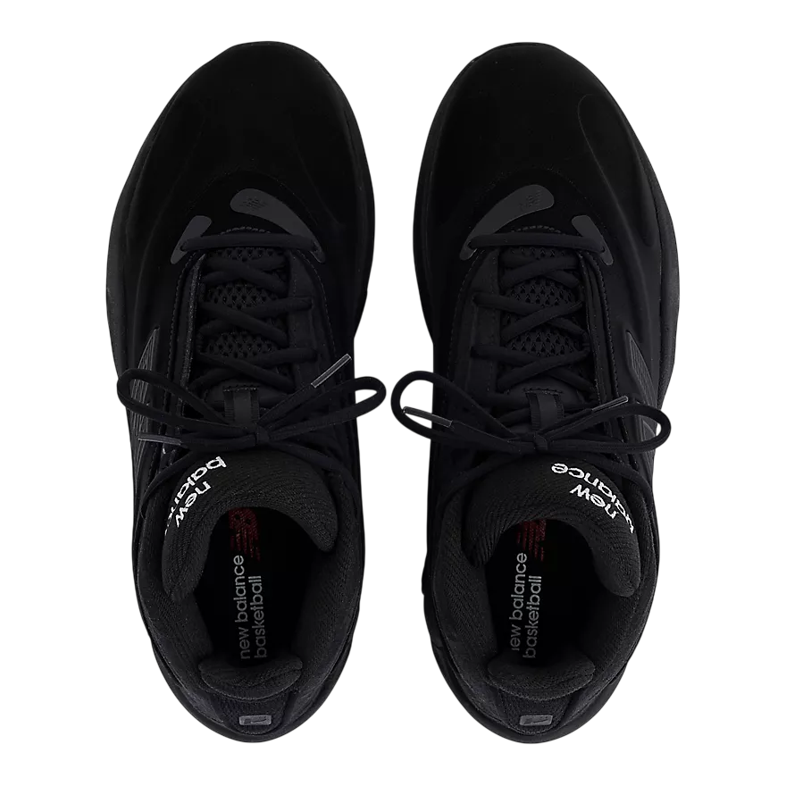 Black athletic shoes with New Balance branding on a white background