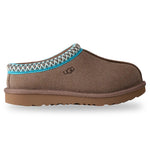 Brown UGG slippers with a decorative strap on a white background - Image 1
