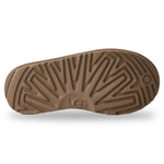 Brown sole of a shoe with 'UGG' branding on a white background - Image 6